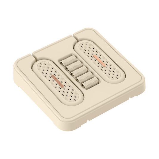 HaloSole foot warmer in cream: square base with two perforated warming pads and a centre row of ribbed rollers