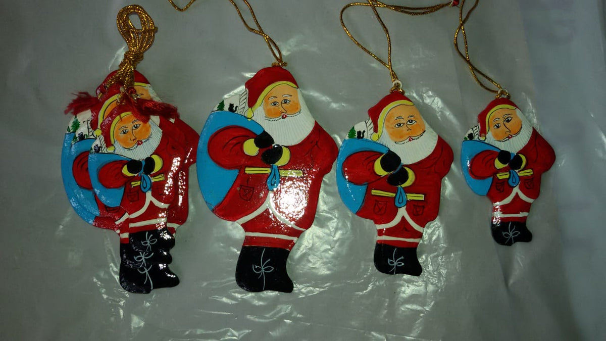Hand-painted papier-mache Santa ornaments