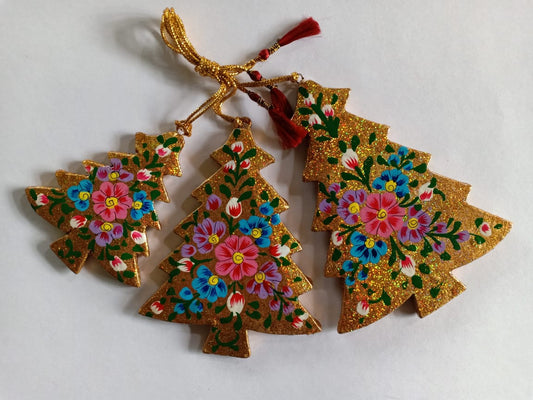 Hand-painted papier-mache Christmas tree ornaments, gold with flowers, set of three shown