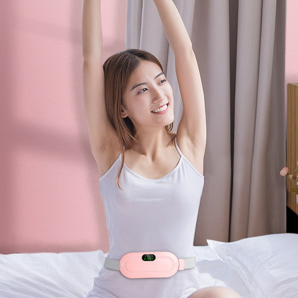 Woman wearing the pink HaloCalm period heating belt around her waist