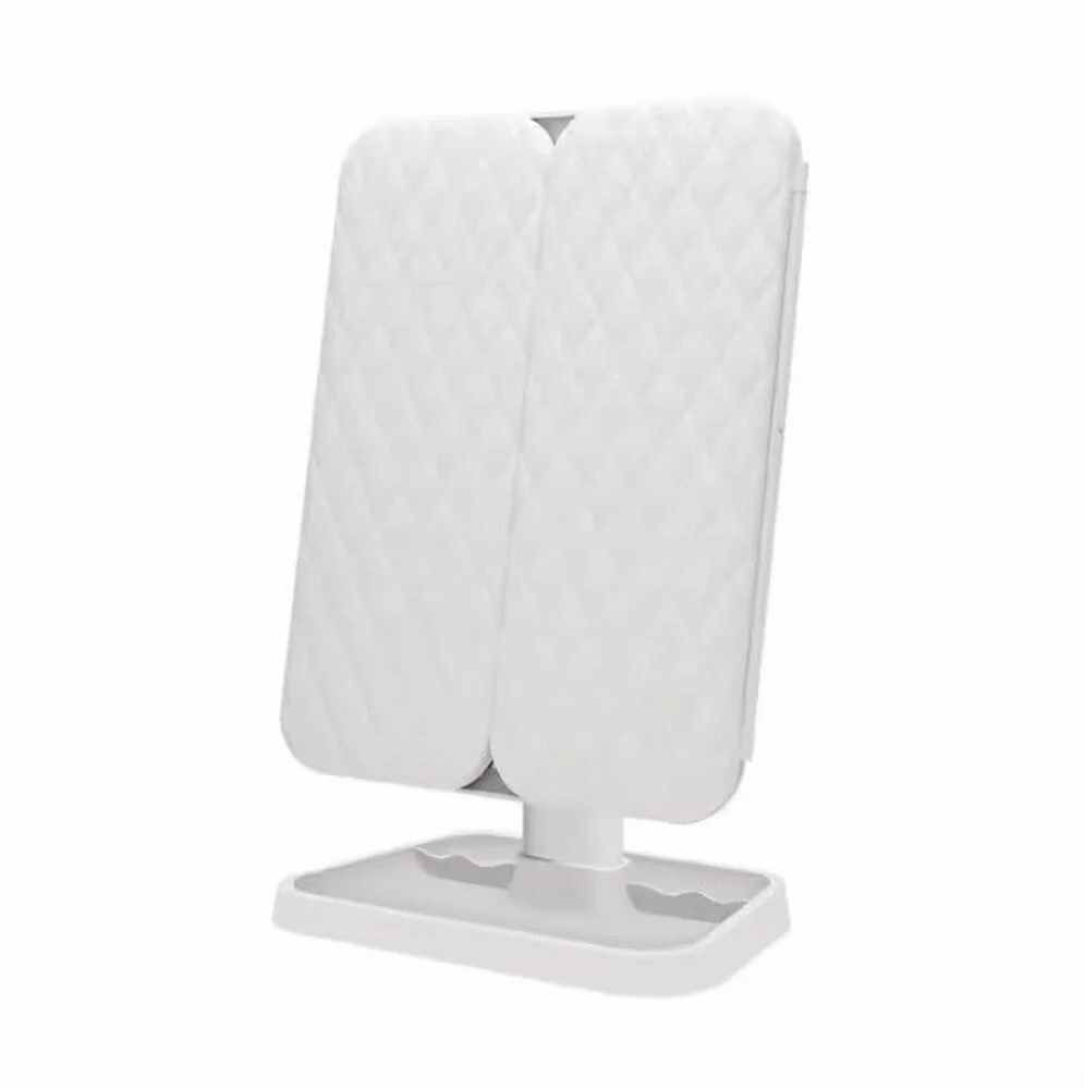 Tri-fold vanity mirror folded closed with quilted cover and base tray
